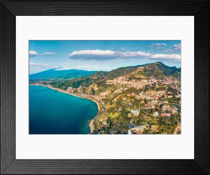 Framed Print : View from flying drone. Marvelous morning view of Taormina town and Etna volcano on background Framed Print : View from flying drone. Marvelous morning view of Taormina town and Etna volcano on background