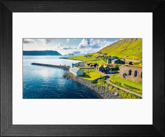 Framed Print : View from flying drone. Aerial summer view of Kirkjubour villagewith Hestur Island on background Framed Print : View from flying drone. Aerial summer view of Kirkjubour villagewith Hestur Island on background