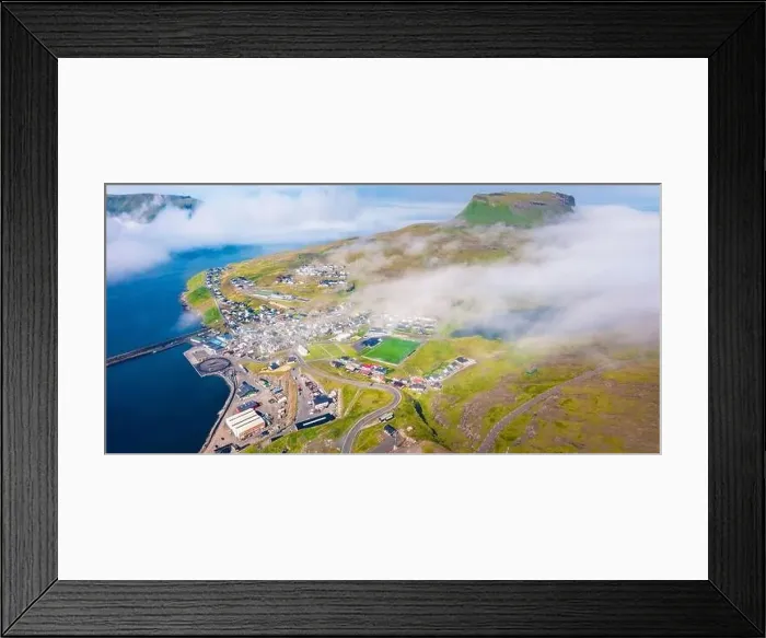 Framed Print : View from flying drone. Foggy morning cityscape of Eidi town Framed Print : View from flying drone. Foggy morning cityscape of Eidi town