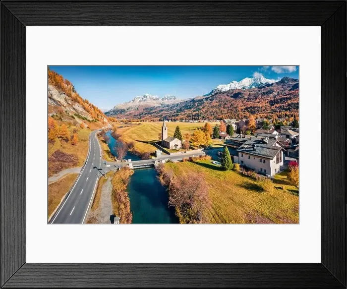 Framed Print : View from flying drone of San Lurench church in Sils im Engadin village Framed Print : View from flying drone of San Lurench church in Sils im Engadin village