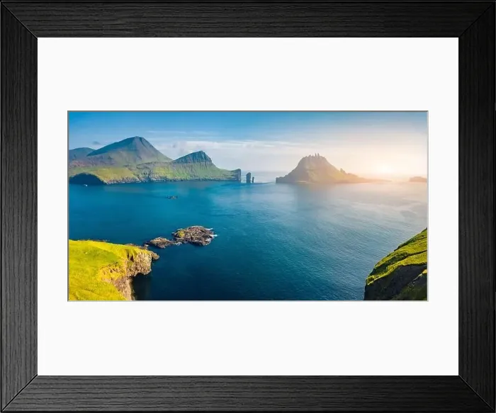 Framed Print : View from flying drone. Magnificent summer scene of Faroe Islands and Tindholmur cliffs on background Framed Print : View from flying drone. Magnificent summer scene of Faroe Islands and Tindholmur cliffs on background