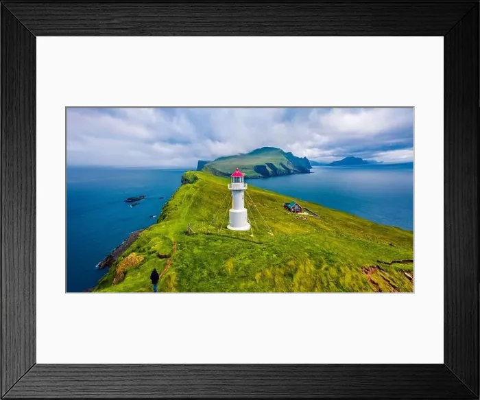 Framed Print : View from flying drone. Magnificent summer scene of Mykines island with old lighthouse Framed Print : View from flying drone. Magnificent summer scene of Mykines island with old lighthouse