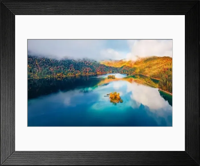 Framed Print : View from flying drone. Misty morning view of Eibsee lake with Zugspitze mountain range on background Framed Print : View from flying drone. Misty morning view of Eibsee lake with Zugspitze mountain range on background