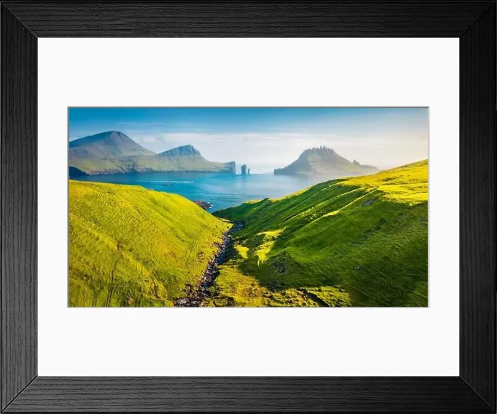 Framed Print : View from flying drone. Colorful summer scene of Faroe Islands and Tindholmur cliffs on background Framed Print : View from flying drone. Colorful summer scene of Faroe Islands and Tindholmur cliffs on background
