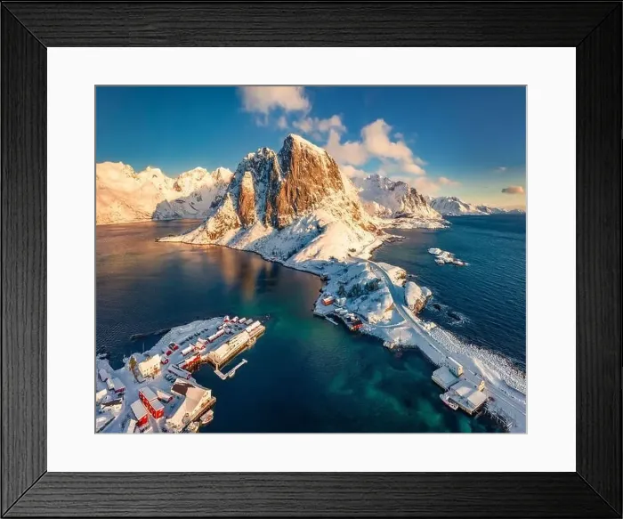 Framed Print : View from flying drone of Hamnoy port with Festhaeltinden mount on background Framed Print : View from flying drone of Hamnoy port with Festhaeltinden mount on background