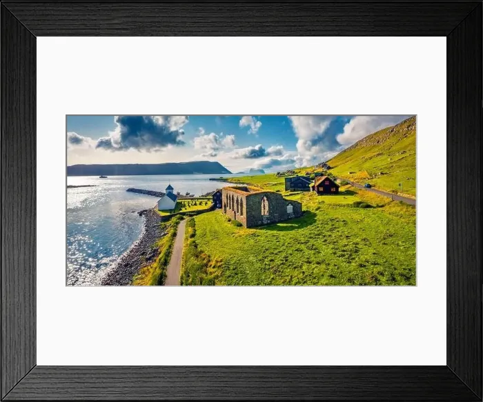 Framed Print : Panoramic summer view from flying drone of Kirkjubour village with Hestur Island on background