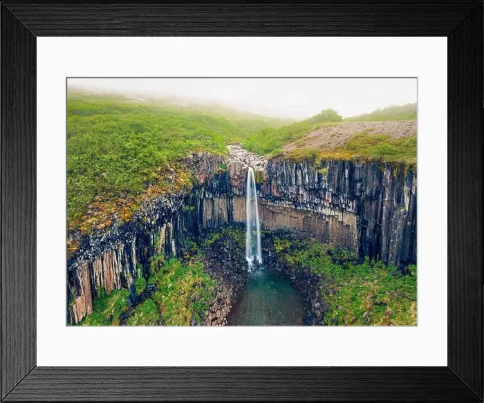 Framed Print : Foggy morning view from flying drone of famous Svartifoss (Black Fall) Waterfall Framed Print : Foggy morning view from flying drone of famous Svartifoss (Black Fall) Waterfall
