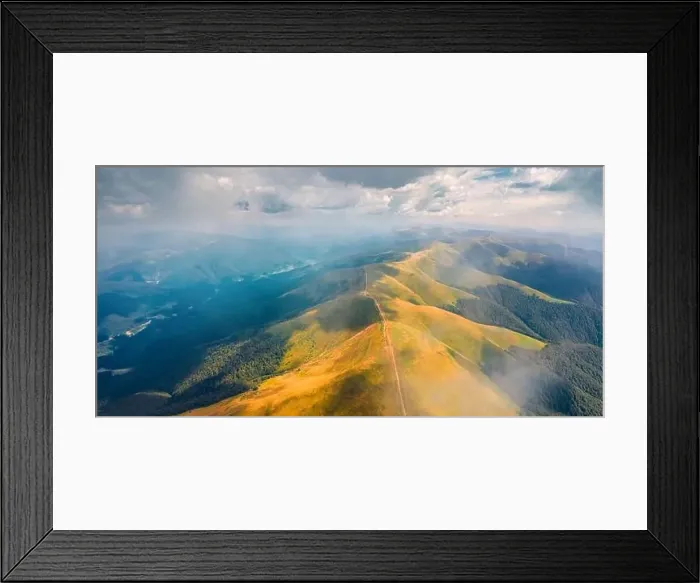 Framed Print : Flying under the clouds. Panoramic summer view from flying drone of Krasna range with old country road Framed Print : Flying under the clouds. Panoramic summer view from flying drone of Krasna range with old country road