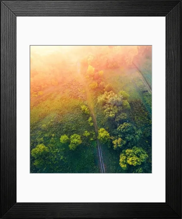 Framed Print : Straight down view of the foggy meadow with old country road Framed Print : Straight down view of the foggy meadow with old country road