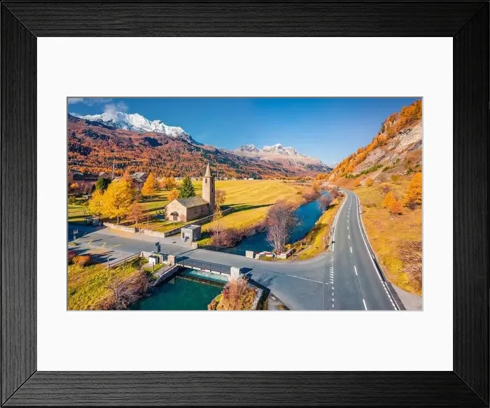 Framed Print : View from flying drone of San Lurench church in Sils im Engadin village Framed Print : View from flying drone of San Lurench church in Sils im Engadin village