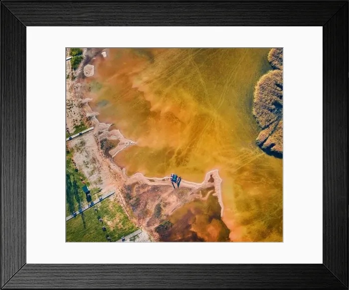 Framed Print : Aerial landscape photography. Straight down view from flying drone of shore and fishing boats on Svityaz lake Framed Print : Aerial landscape photography. Straight down view from flying drone of shore and fishing boats on Svityaz lake