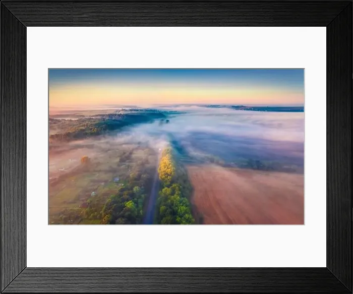 Framed Print : Colorful summer view from flying drone of Ukrainian countryside with field of wheat and asphalt road