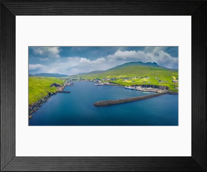 Framed Print : Aerial landscape photography. Gloomy summer view from flying drone of Sandavagur village Framed Print : Aerial landscape photography. Gloomy summer view from flying drone of Sandavagur village