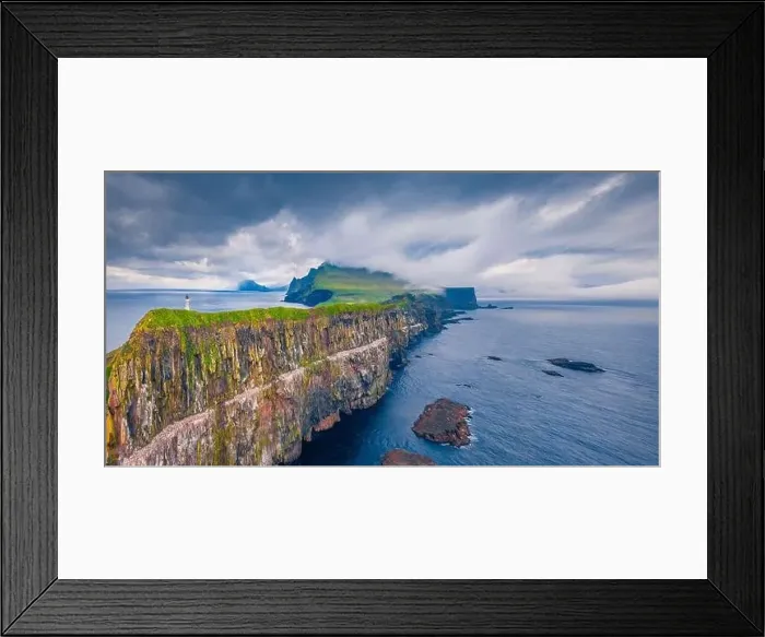 Framed Print : Aerial landscape photography. Fantastic view from flying drone of Mykines island with lighthouse Framed Print : Aerial landscape photography. Fantastic view from flying drone of Mykines island with lighthouse