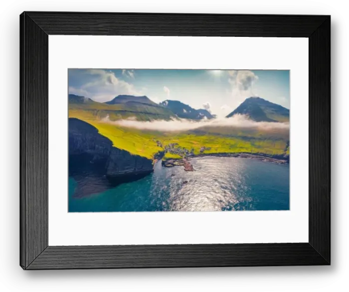 Framed Print : Aerial landscape photography. Sunny morning view from flying drone of Gjogv village Framed Print : Aerial landscape photography. Sunny morning view from flying drone of Gjogv village