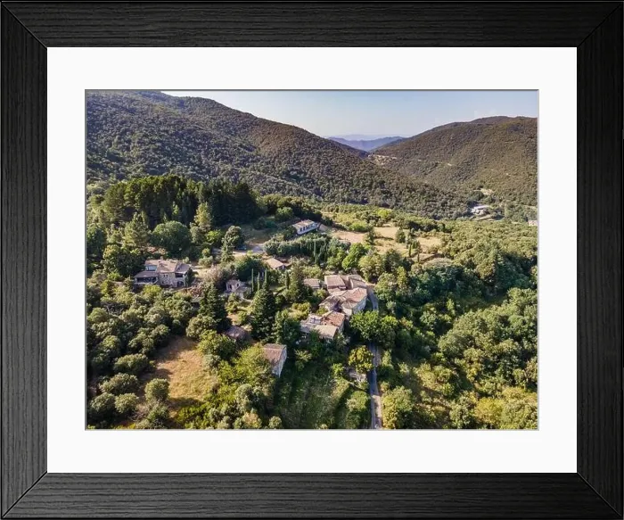 Framed Print : Aerial view of the village of Soudorgues in the Cevennes mountains (South of Massif Central, France) Framed Print : Aerial view of the village of Soudorgues in the Cevennes mountains (South of Massif Central, France)