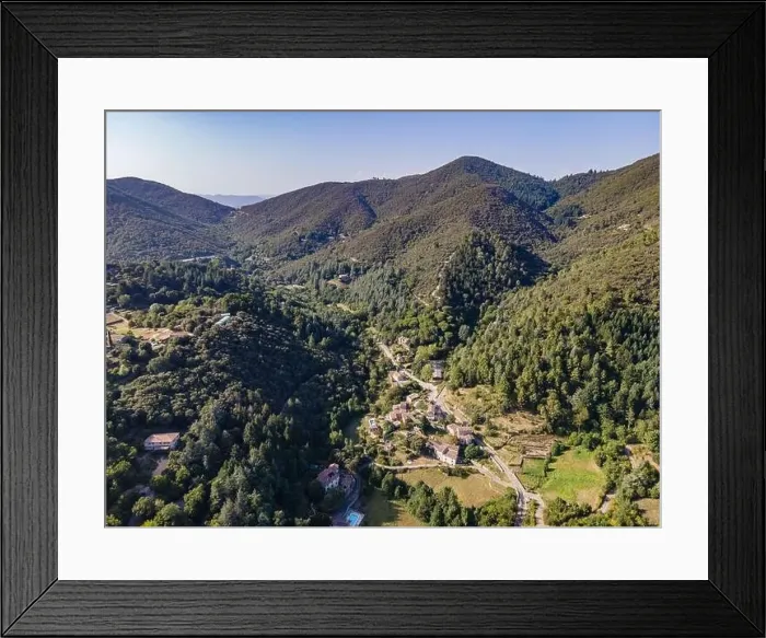 Framed Print : Aerial view of the village of Soudorgues in the Cevennes mountains (South of Massif Central, France) Framed Print : Aerial view of the village of Soudorgues in the Cevennes mountains (South of Massif Central, France)
