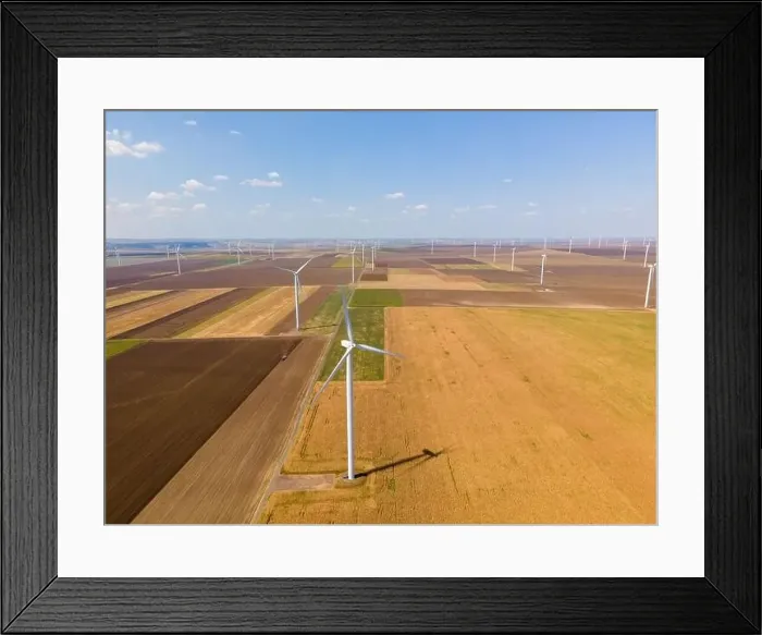 Framed Print : Aerial photography of a wind turbine from a wind farm in country side Framed Print : Aerial photography of a wind turbine from a wind farm in country side