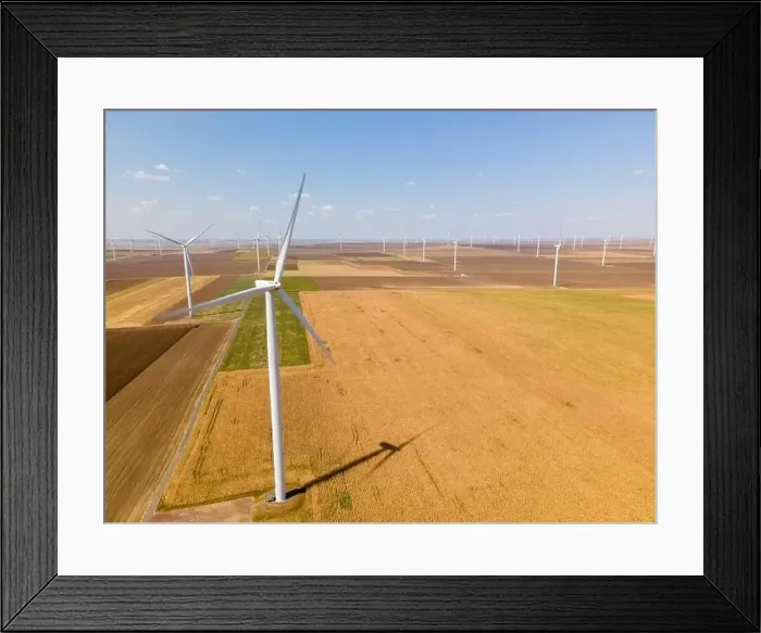 Framed Print : Aerial photography of a wind turbine from a wind farm in country side Framed Print : Aerial photography of a wind turbine from a wind farm in country side