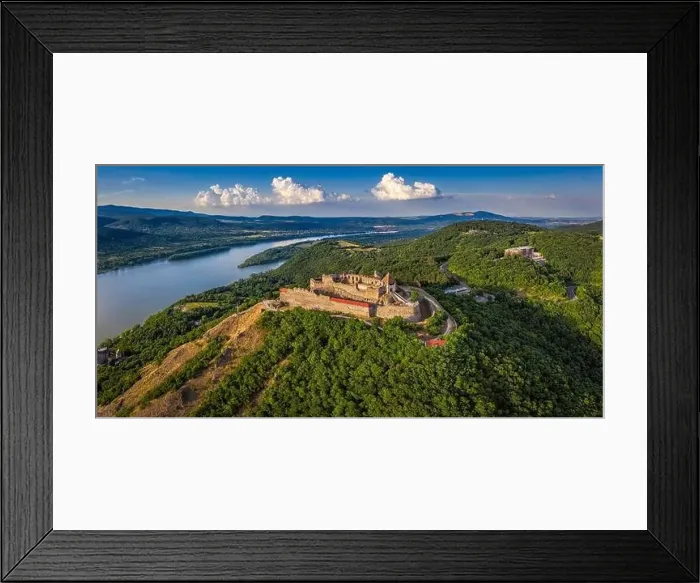 Framed Print : Visegrad, Hungary - Aerial panoramic drone view of the beautiful high castle of Visegrad with summer foliage and trees Framed Print : Visegrad, Hungary - Aerial panoramic drone view of the beautiful high castle of Visegrad with summer foliage and trees