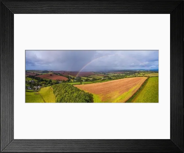 Framed Print : Rainbow over the Fields over Compton Castle from a drone, Compton, Devon, England, Europe Framed Print : Rainbow over the Fields over Compton Castle from a drone, Compton, Devon, England, Europe