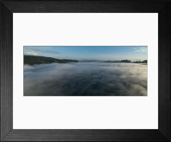 Framed Print : Aerial view Panorama of flowing fog waves on mountain tropical rainforest Framed Print : Aerial view Panorama of flowing fog waves on mountain tropical rainforest