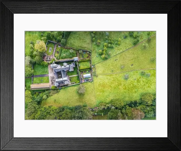 Framed Print : Top Down panorama of Compton Castle from a drone, Devon, England, Europe Framed Print : Top Down panorama of Compton Castle from a drone, Devon, England, Europe