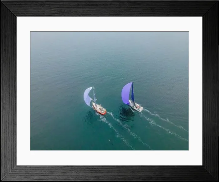 Framed Print : Aerial bird's eye view photo taken by drone of sailboat in turquoise sea water