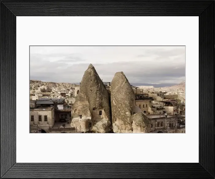 Framed Print : Ancient stone dwellings carved from tuff in Cappadocia Framed Print : Ancient stone dwellings carved from tuff in Cappadocia