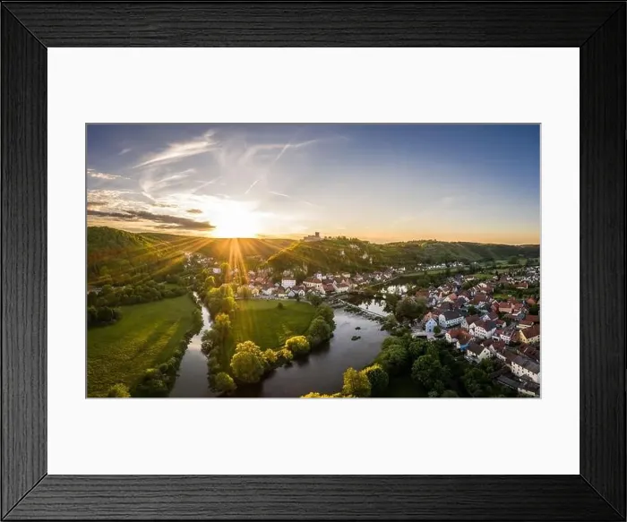 Framed Print : Aerial photo with drone of market Kallmünz Kallmuenz in Bavaria with river Naab and Vils and castle ruin during sunset Framed Print : Aerial photo with drone of market Kallmünz Kallmuenz in Bavaria with river Naab and Vils and castle ruin during sunset