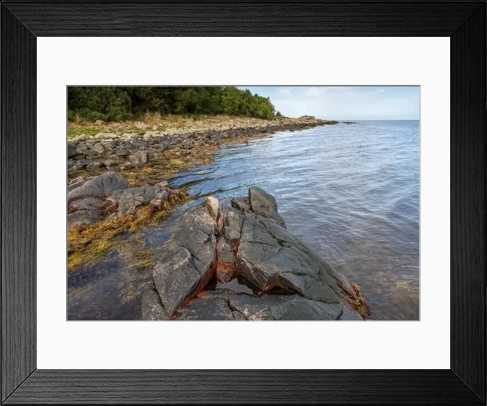 Framed Print : A picture of a rock against the blue water. Picture from Skalderviken, southern Sweden Framed Print : A picture of a rock against the blue water. Picture from Skalderviken, southern Sweden