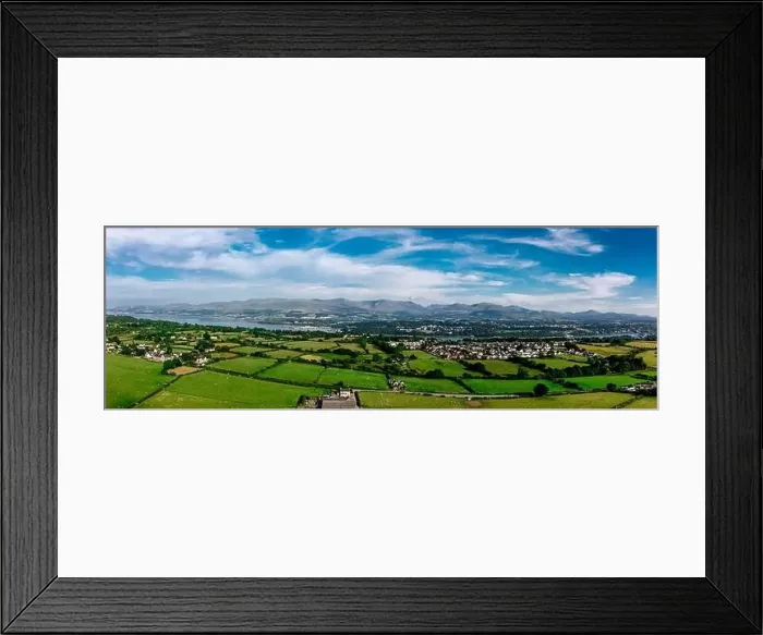 Framed Print : Aerial view of snowdonia landscape in the distance from Anglesey Framed Print : Aerial view of snowdonia landscape in the distance from Anglesey