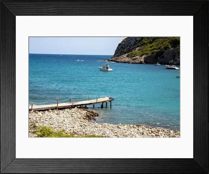 Framed Print : The Spanish island of Ibiza showing the beautiful beach front and board walk Framed Print : The Spanish island of Ibiza showing the beautiful beach front and board walk