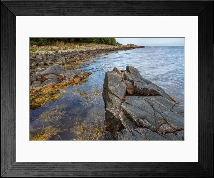 Framed Print : A picture of a rock against the blue water. Picture from Skalderviken, southern Sweden Framed Print : A picture of a rock against the blue water. Picture from Skalderviken, southern Sweden