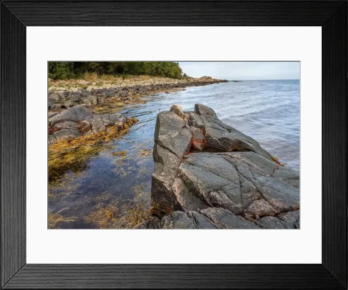 Framed Print : A picture of a rock against the blue water. Picture from Skalderviken, southern Sweden Framed Print : A picture of a rock against the blue water. Picture from Skalderviken, southern Sweden