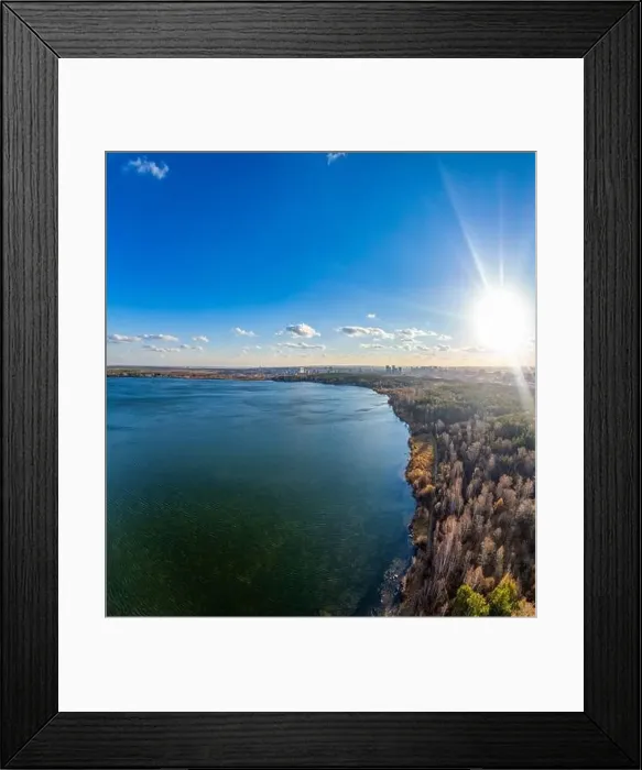 Framed Print : Autumn forest on lake shore at sunset and city on horizon, auerial view. Lake Shartash and Yekaterinburg, Russia Framed Print : Autumn forest on lake shore at sunset and city on horizon, auerial view. Lake Shartash and Yekaterinburg, Russia