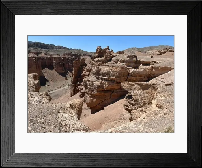 Framed Print : Canyon, panoramic sunlit view with rocks and road