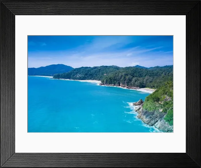 Framed Print : Aerial view of blue ocean and tropical beach over sky background Framed Print : Aerial view of blue ocean and tropical beach over sky background
