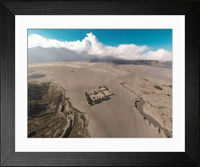 Framed Print : Cinematic shot aerial view of Pura Luhur Poten hindu temple near Mount Bromo volcano in East Java Framed Print : Cinematic shot aerial view of Pura Luhur Poten hindu temple near Mount Bromo volcano in East Java