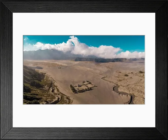 Framed Print : Cinematic shot aerial view of Pura Luhur Poten hindu temple near Mount Bromo volcano in East Java Framed Print : Cinematic shot aerial view of Pura Luhur Poten hindu temple near Mount Bromo volcano in East Java