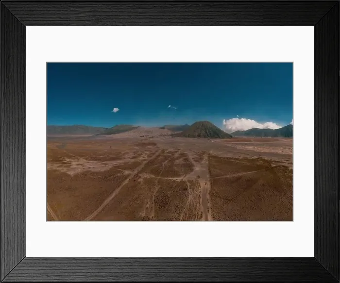 Framed Print : Cinematic shot view of beautiful Mount Bromo volcano with desert in East Java Framed Print : Cinematic shot view of beautiful Mount Bromo volcano with desert in East Java