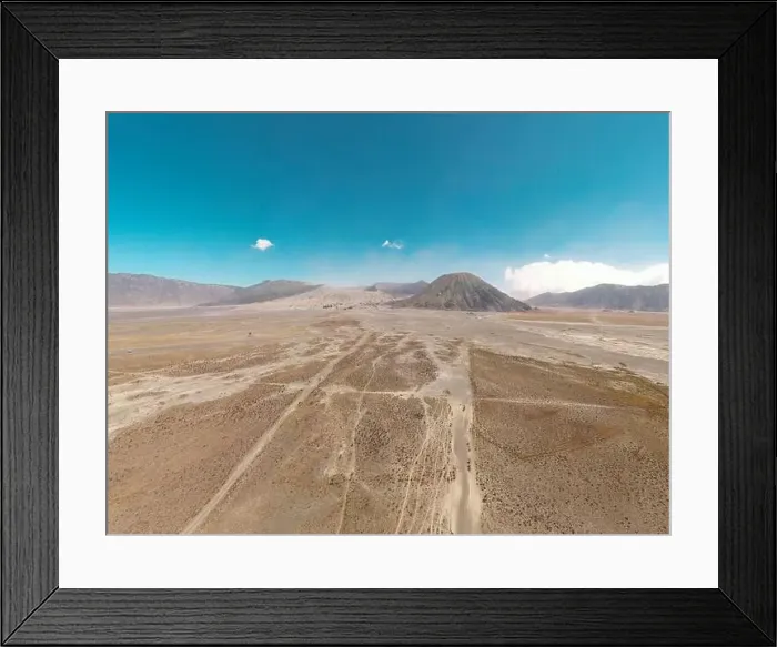 Framed Print : Cinematic shot aerial view of beautiful Mount Bromo volcano with desert in East Java Framed Print : Cinematic shot aerial view of beautiful Mount Bromo volcano with desert in East Java