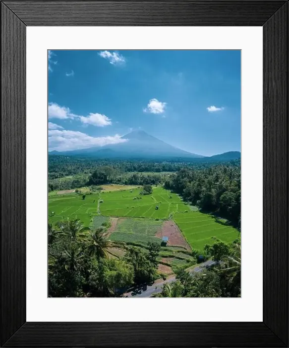 Framed Print : Aerial view of volcano and beautiful fields landscape during sunny summer day in Bali Framed Print : Aerial view of volcano and beautiful fields landscape during sunny summer day in Bali