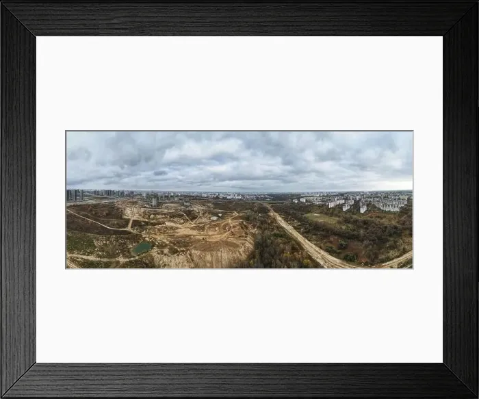 Framed Print : Construction of a modern city block Multi-storey buildings made of glass and concrete Framed Print : Construction of a modern city block Multi-storey buildings made of glass and concrete