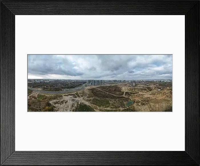 Framed Print : Construction of a modern city block Multi-storey buildings made of glass and concrete Framed Print : Construction of a modern city block Multi-storey buildings made of glass and concrete