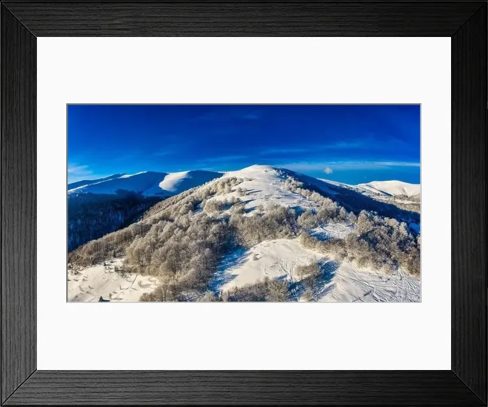 Framed Print : Aerial view of beautiful winter mountain slopes Framed Print : Aerial view of beautiful winter mountain slopes