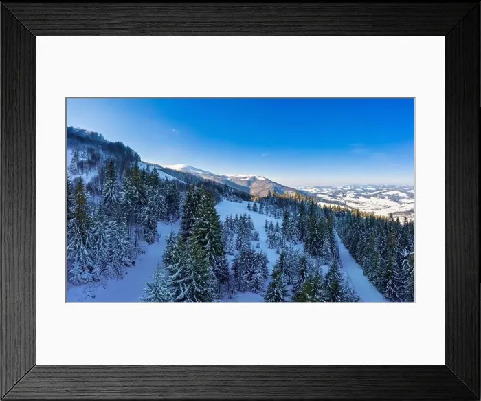 Framed Print : Aerial view of beautiful winter mountain slopes Framed Print : Aerial view of beautiful winter mountain slopes