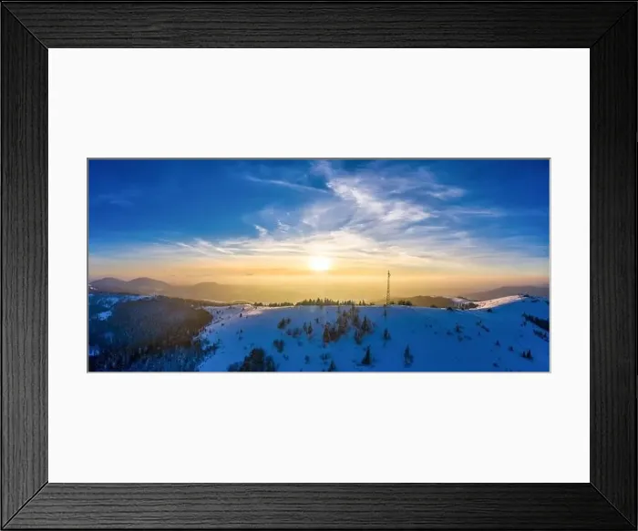 Framed Print : Flying over radio tower in mountains, snow covered winter landscape Framed Print : Flying over radio tower in mountains, snow covered winter landscape