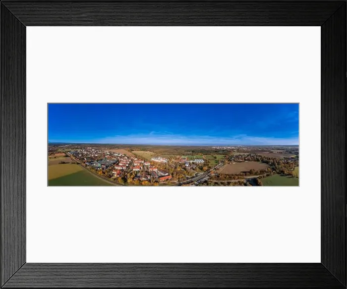 Framed Print : Wide view over the bavarian city Oberhaching in colors of the indian summer as panoramic aerial photo Framed Print : Wide view over the bavarian city Oberhaching in colors of the indian summer as panoramic aerial photo