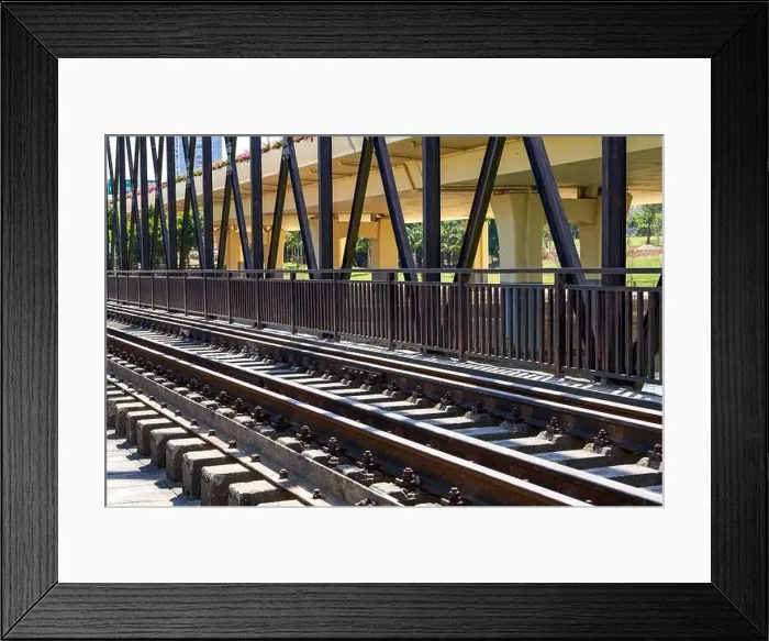 Framed Print : A railway bridge and railway tracks Framed Print : A railway bridge and railway tracks